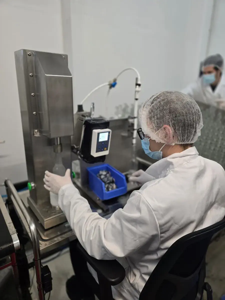 Team members at the AWAKE filling line