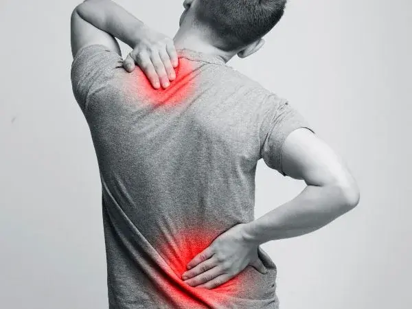 Man with back pain due to silent inflammation